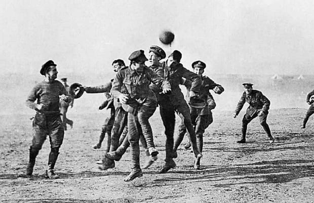 British and German soldiers playing football together during the Christmas truce, 1914.